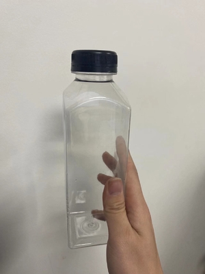 250 ml 350 ml πλαστικό τετραγωνικό κενό σαφές μπουκάλια χυμού μπουκάλια PET ποτών με μαύρα καπάκια